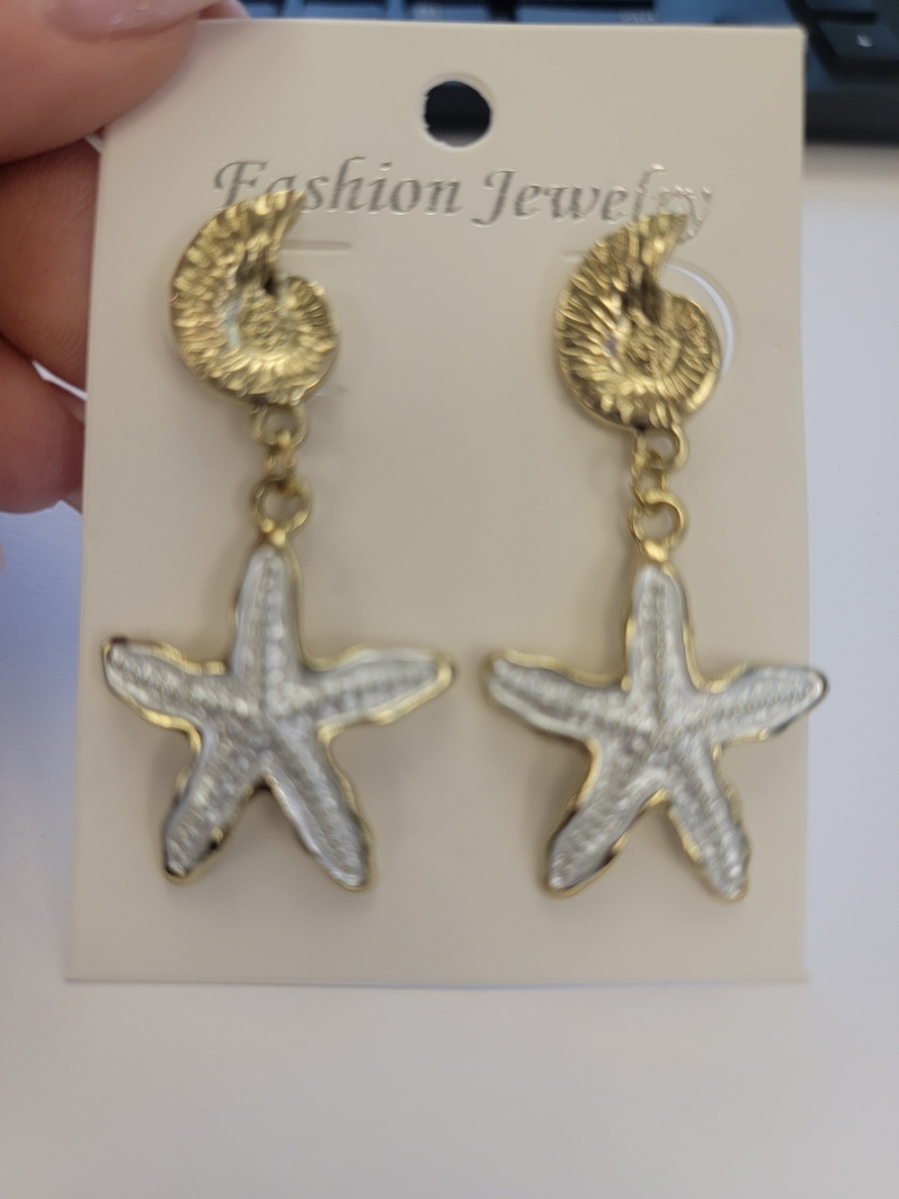 Gold and White Starfish Dangle Earrings